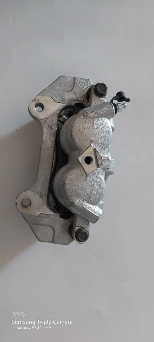 کالیپر ترمز چرخ جلو سمت چپ | T21-3501050