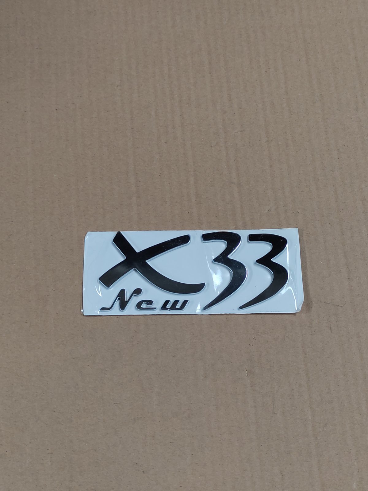 آرم "new X33"